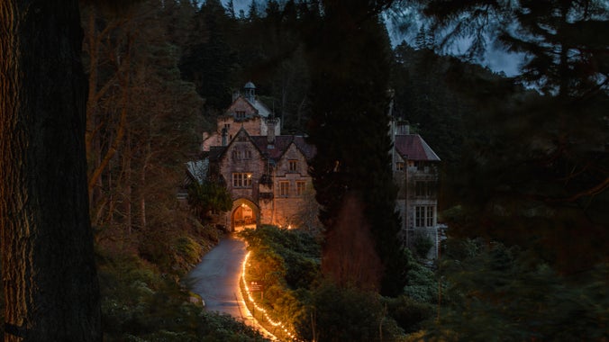 The drive leading to Cragside House illuminated with Christmas fairy lights